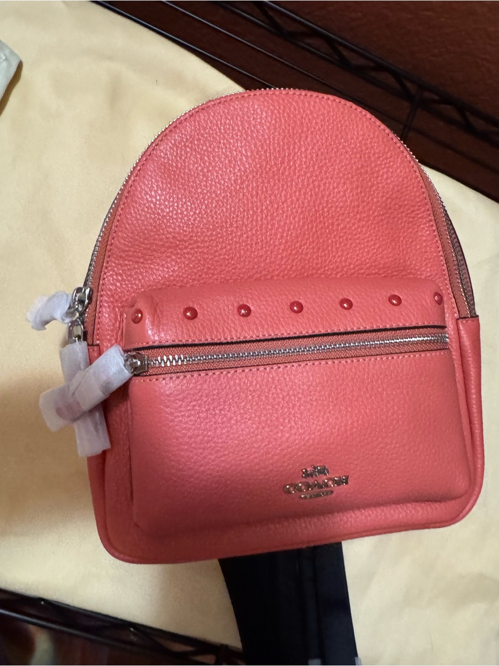 Coach Pebbled Coral Mini Backpack with Stud Accents